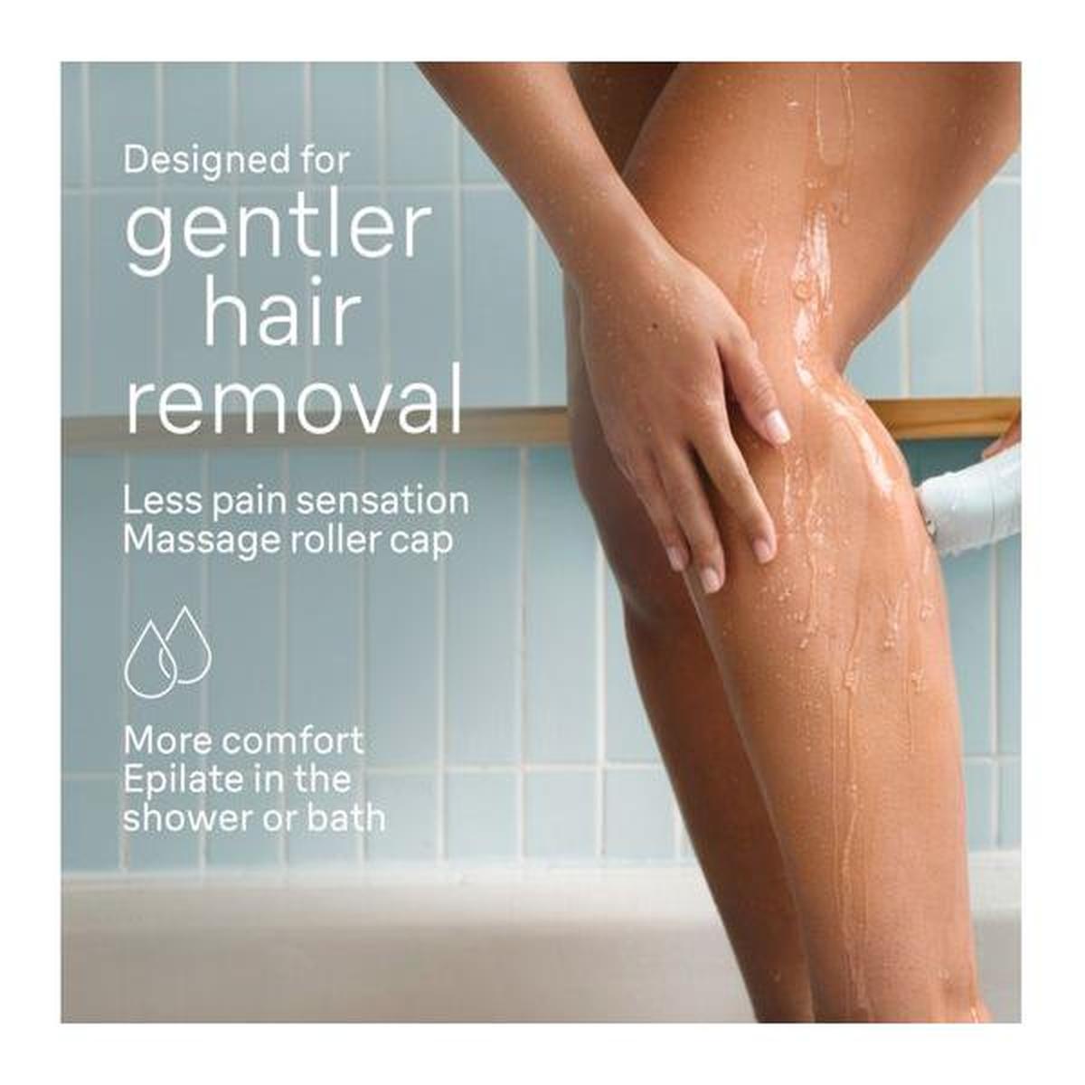 Braun Silk-épil 5 wet and dry epilator with massage roller cap being used on a leg in the shower for gentle hair removal.