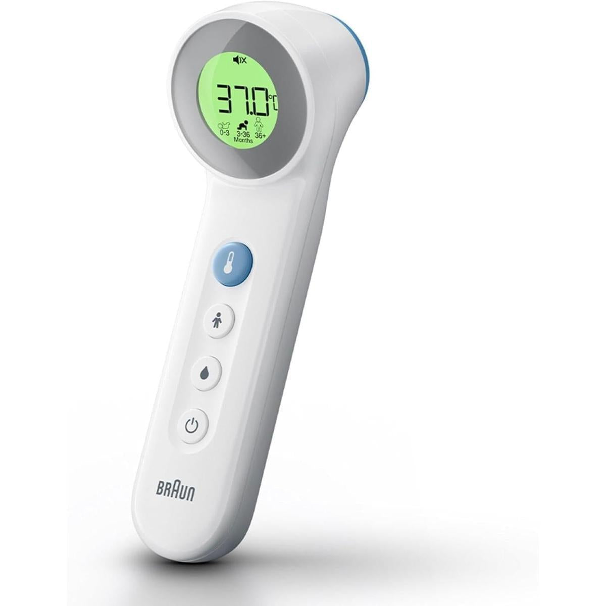 White Braun Sensian 7 non-contact thermometer with a green backlit digital display and blue function buttons.