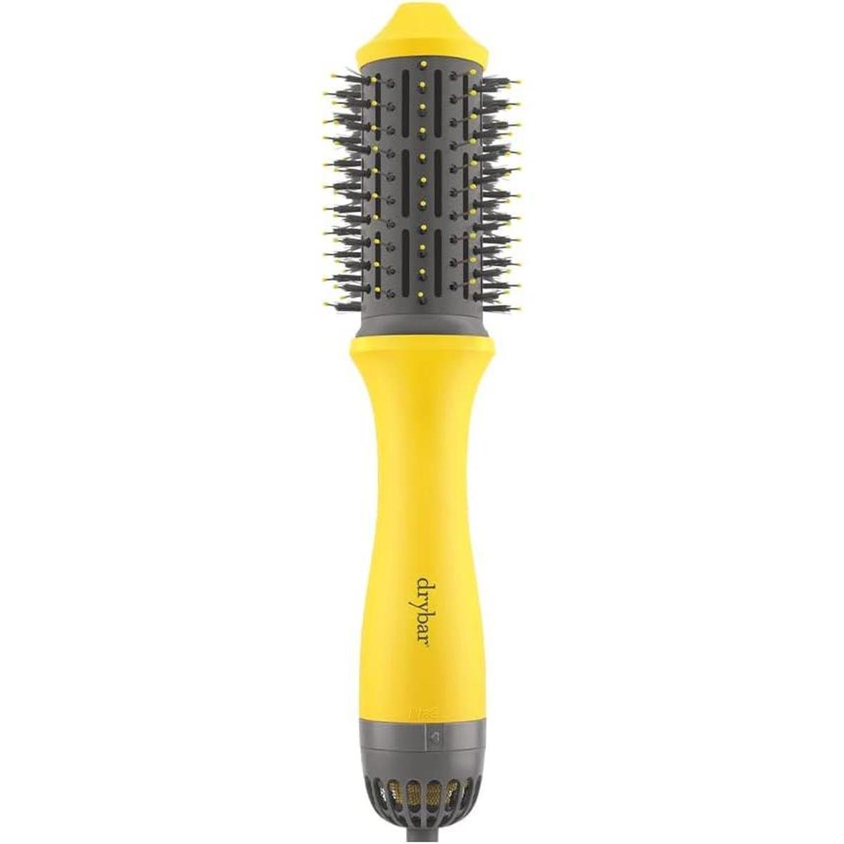 Drybar Single Shot yellow and grey oval blow-dryer brush with vented barrel and ionic bristles for volume.