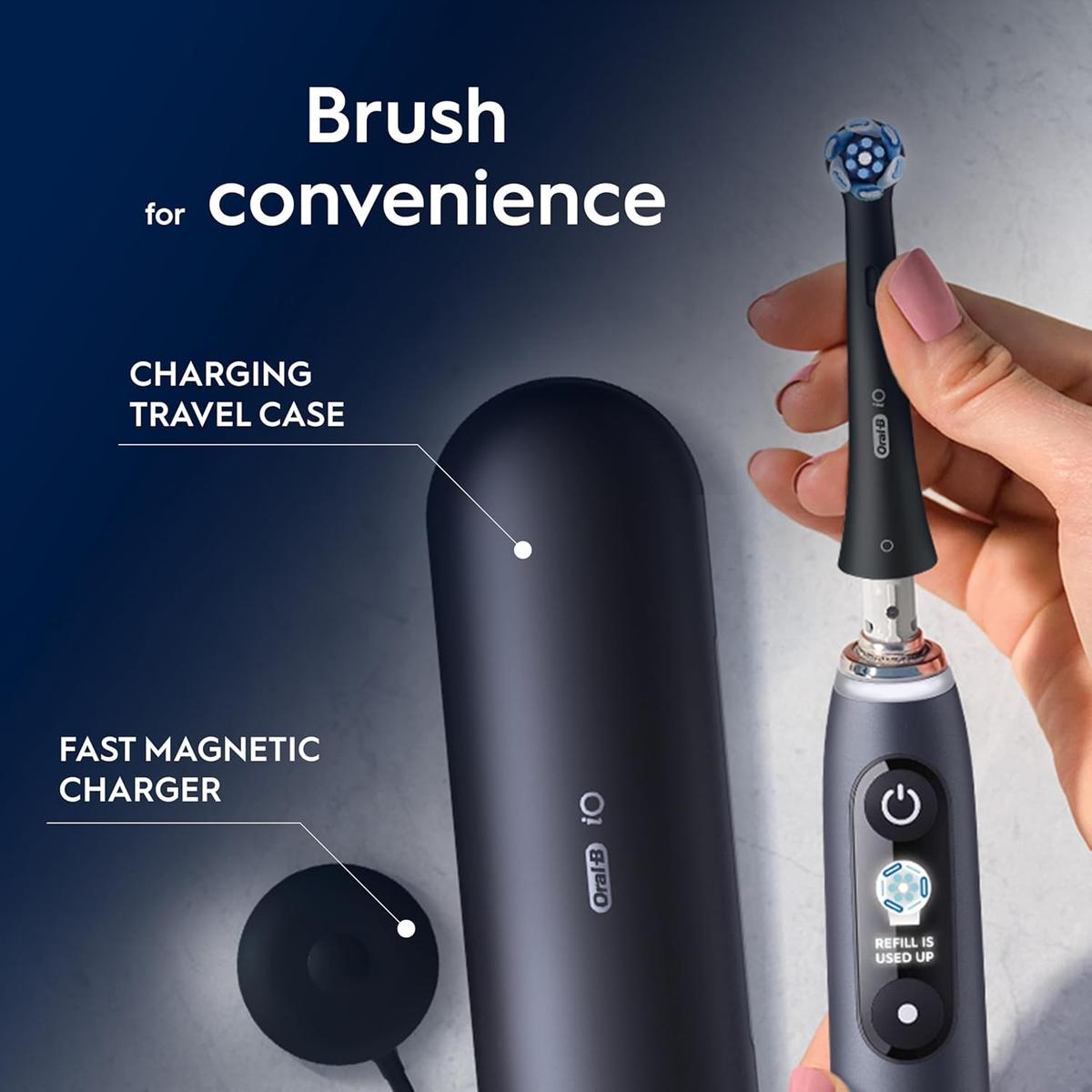 Black Onyx Oral-B iO9 electric toothbrush with interactive display, charging travel case, and magnetic charger.