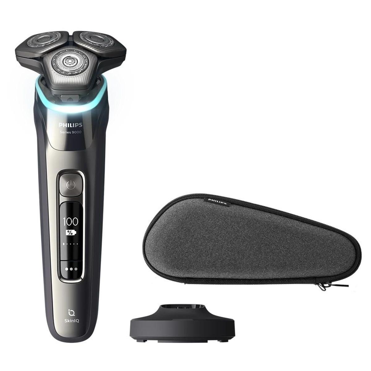 Philips Series 9000 electric shaver in dark metallic grey with 360-degree heads, digital display, charging base, and case.
