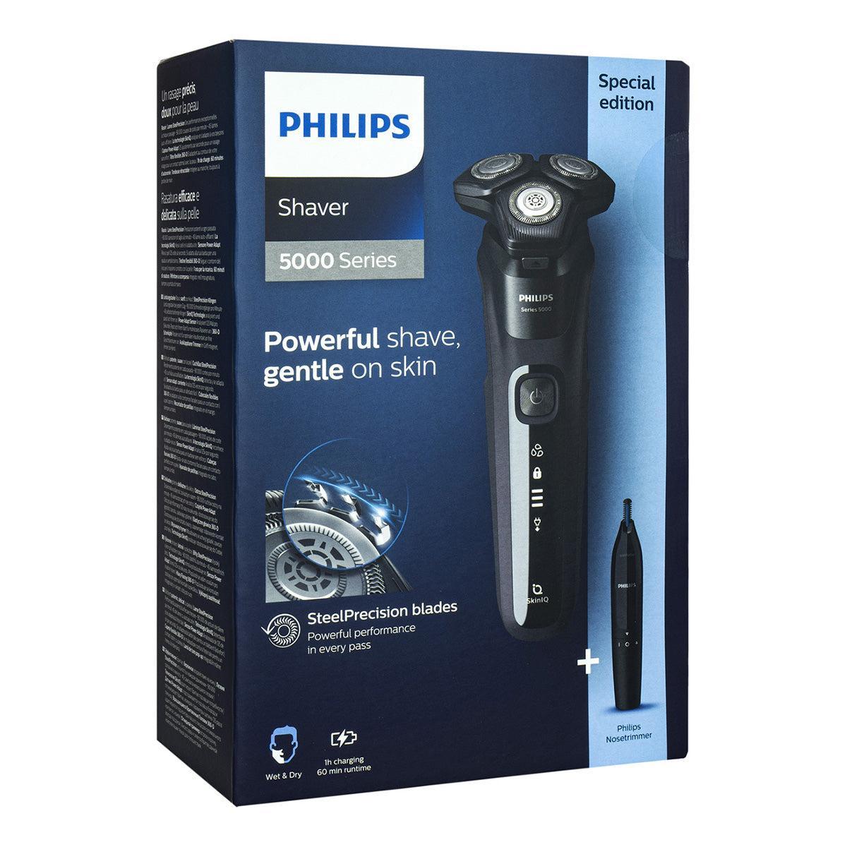 Philips Series 5000 electric shaver and nose trimmer in black packaging with SkinIQ technology and SteelPrecision blades.