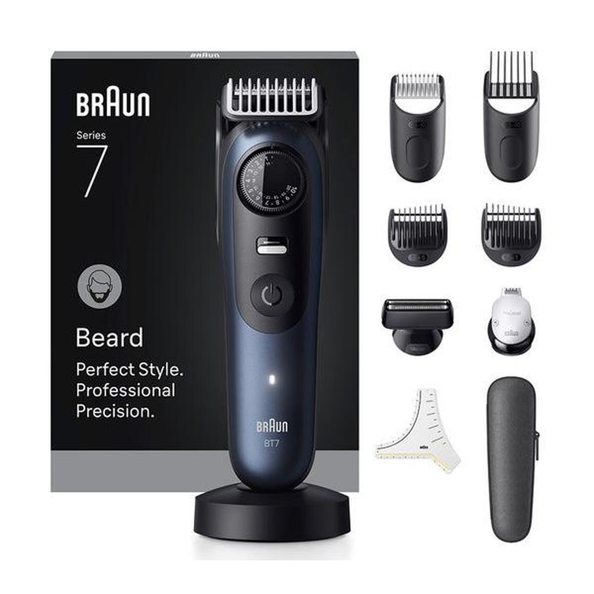Blue Braun Series 7 beard trimmer with precision dial, multiple combs, shaving heads, and travel case on display.