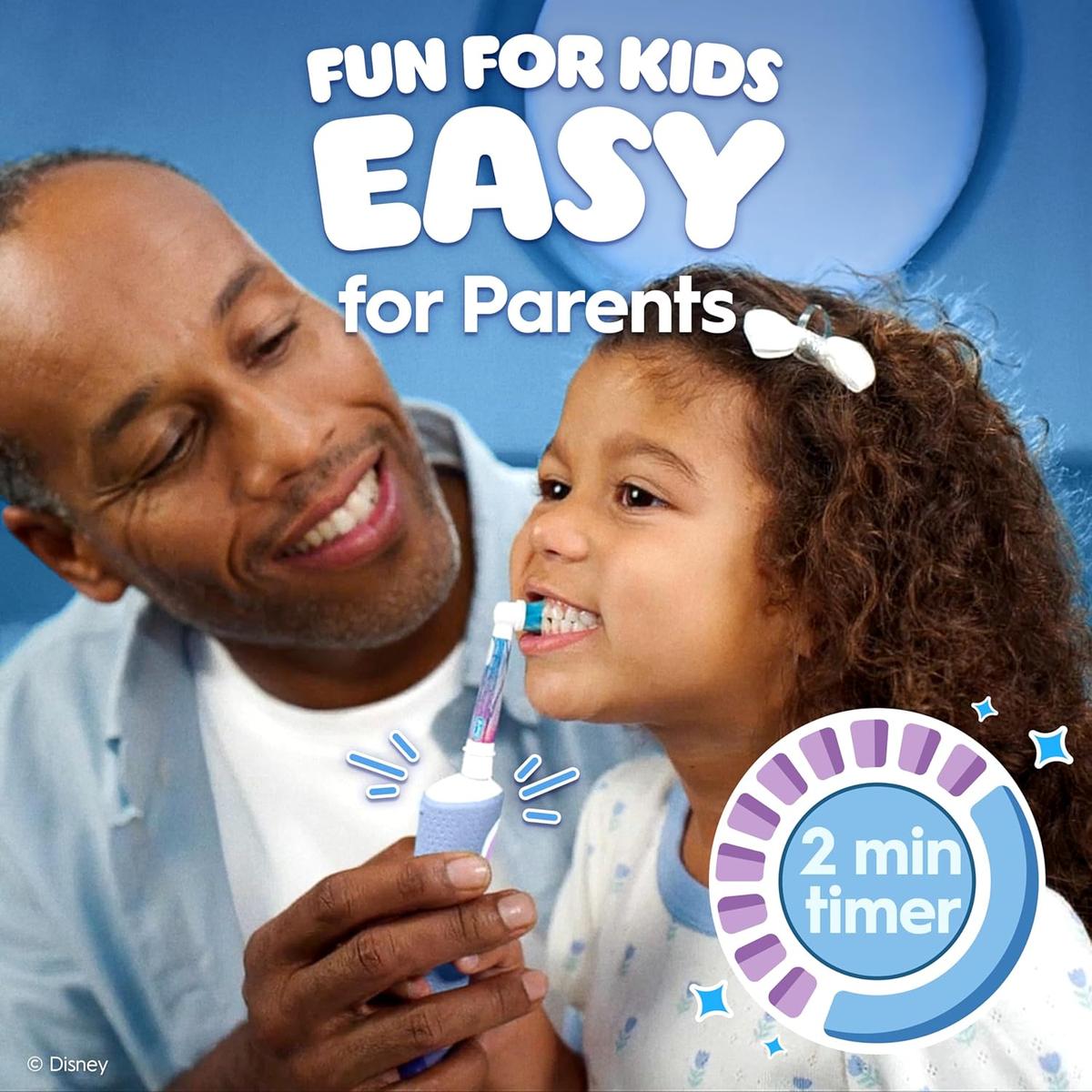 Father helping a young girl brush her teeth with a blue Oral-B Pro Kids electric toothbrush featuring a 2-minute timer graphic.