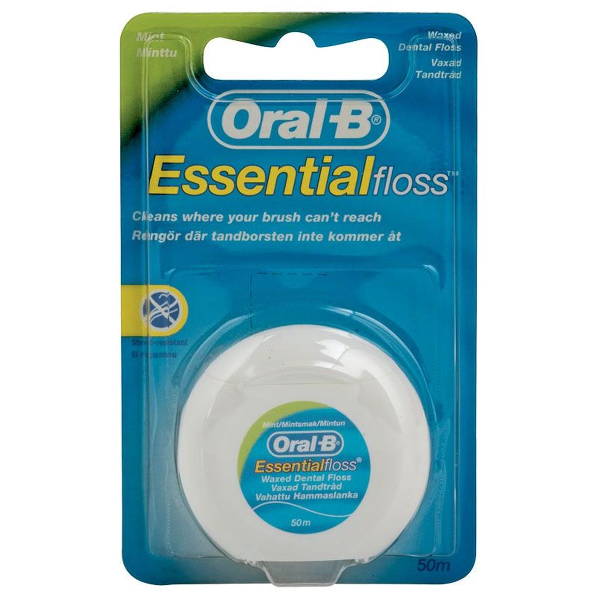 Oral-B Essential Floss 50m mint waxed dental floss in a white round dispenser on blue retail blister packaging.