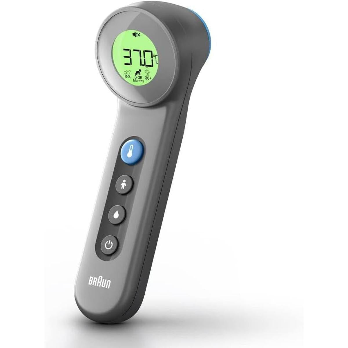 Grey Braun Sensian 7 non-contact thermometer with a green backlit digital display and age-selection buttons.