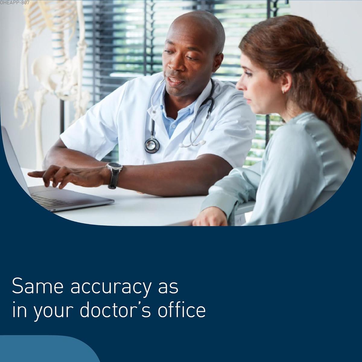 Doctor in a white coat consulting with a patient on a laptop, highlighting clinical accuracy for home blood pressure monitoring.