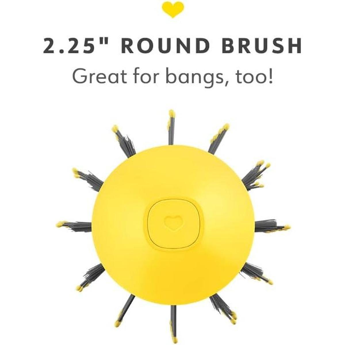 Top view of yellow Drybar 2.25-inch round blow-dryer brush with grey bristles and a central heart-shaped button.