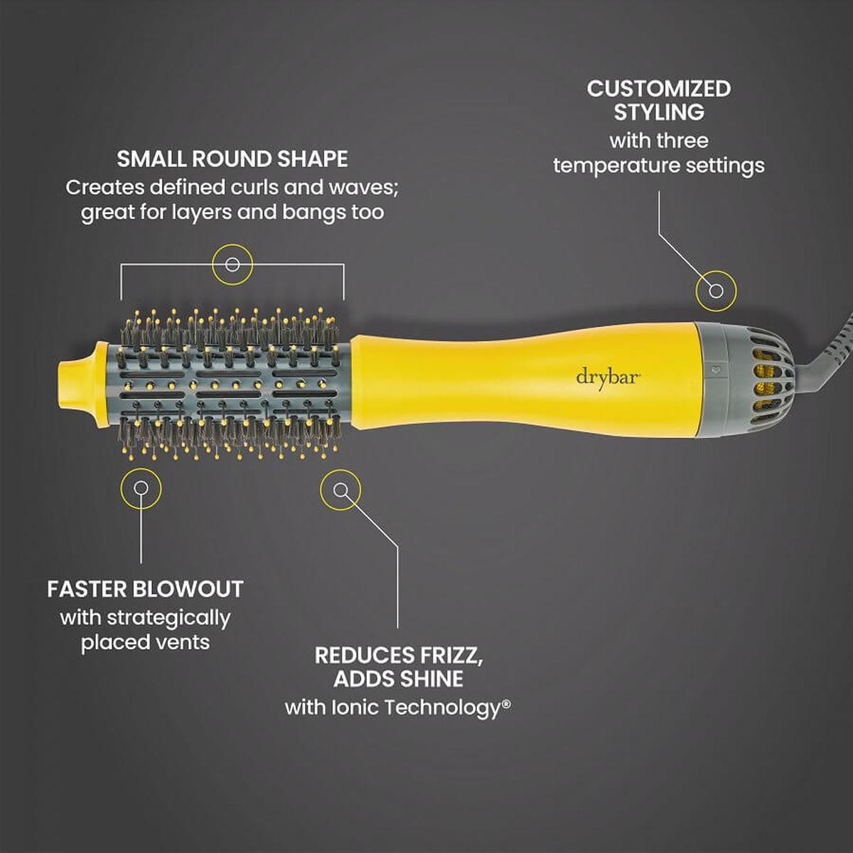 Drybar Half Shot 3.8cm round blow-dryer brush in yellow with tufted bristles and labeled features for styling.