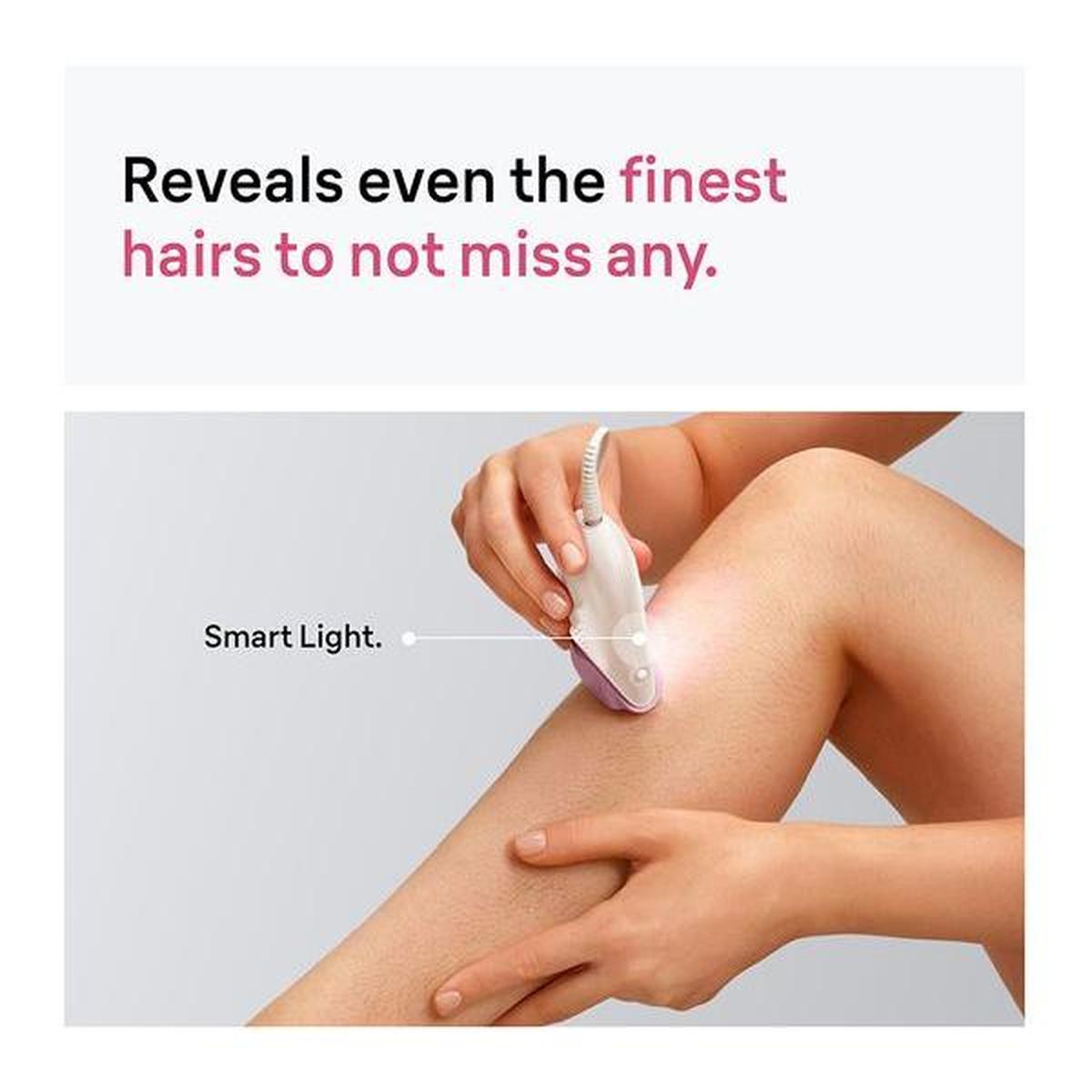 White and pink Braun Silk-épil 3 epilator with Smart Light feature being used on a leg to reveal fine hairs.