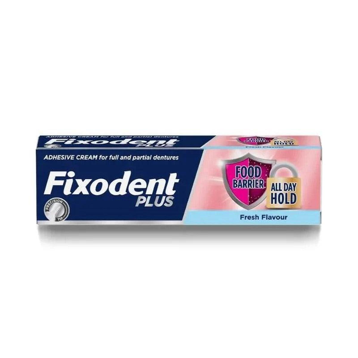 Fixodent Plus Food Barrier denture adhesive 40g tube in blue and pink packaging with a precision tip nozzle design.