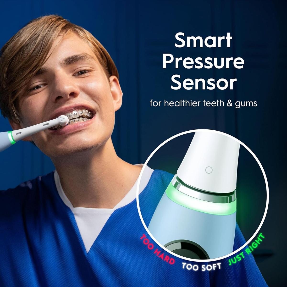 Person with braces using an Oral-B iO9 electric toothbrush with a green light indicating optimal pressure.