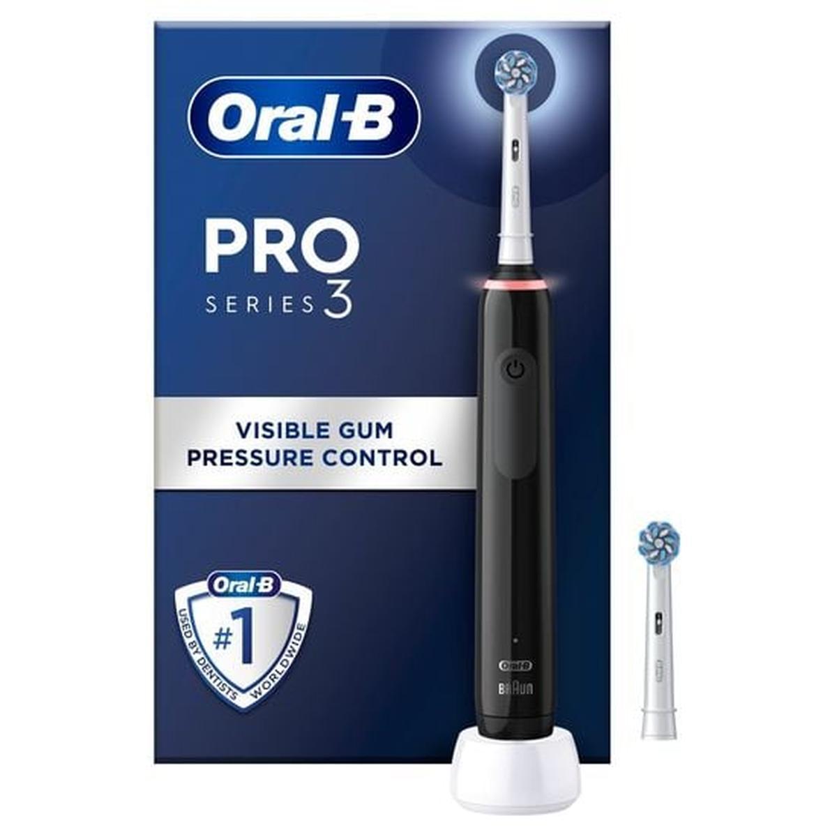 Black Oral-B Pro 3 electric toothbrush with round brush head, charging base, and extra head against blue product packaging.