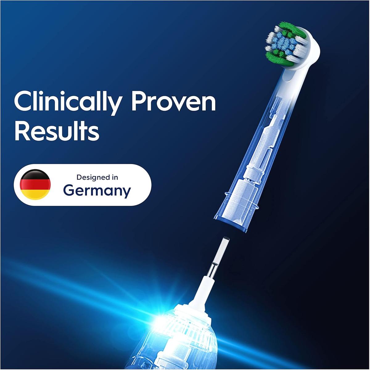 Oral-B Precision Clean electric toothbrush head with X-shape green and white bristles on a blue background.
