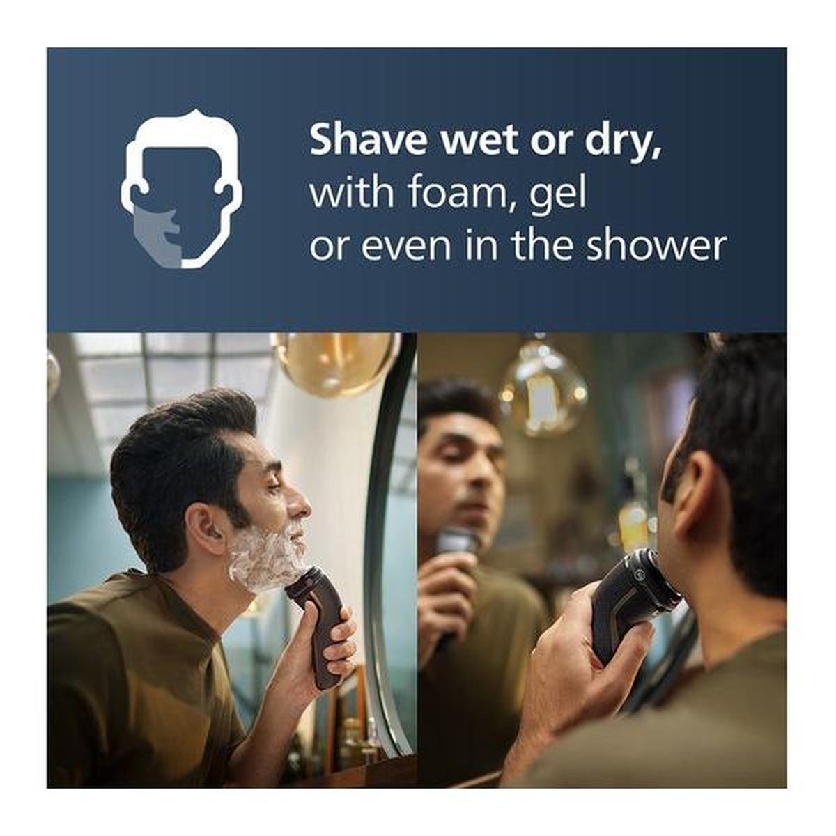 Man using a black Philips Series 3000 rotary shaver with shaving foam in front of a mirror for wet or dry shaving.
